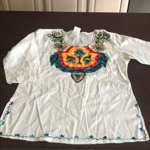 Embroidered white cotton tunic